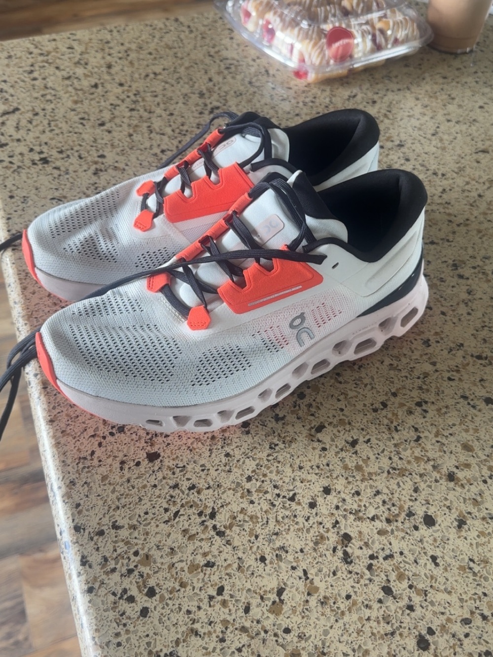 On Running White and Orange Women's Cloud Sneaker